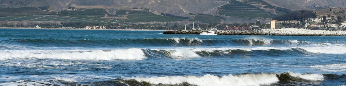 Photo by Pamela Heckel sea waves crashing on shore during daytime